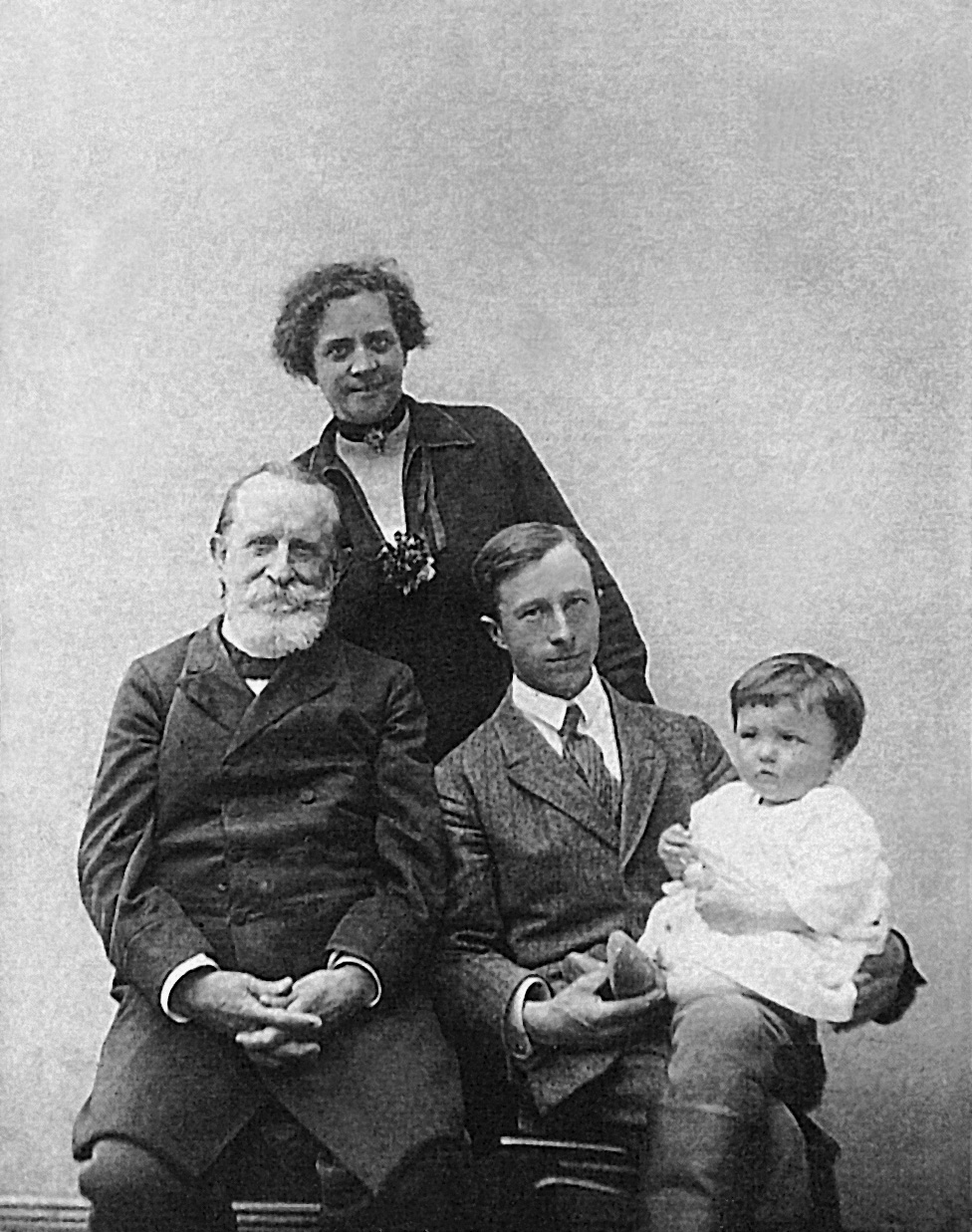Four generations: Maria Chełkowska née Donimirska of Śmiełów (standing), Jan Donimirski, her father, Franek Chełkowski, her son, with Józek Chełkowski, his son on his lap (1926, Buchwald)